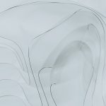 A close up of a white sheet with a pattern on it