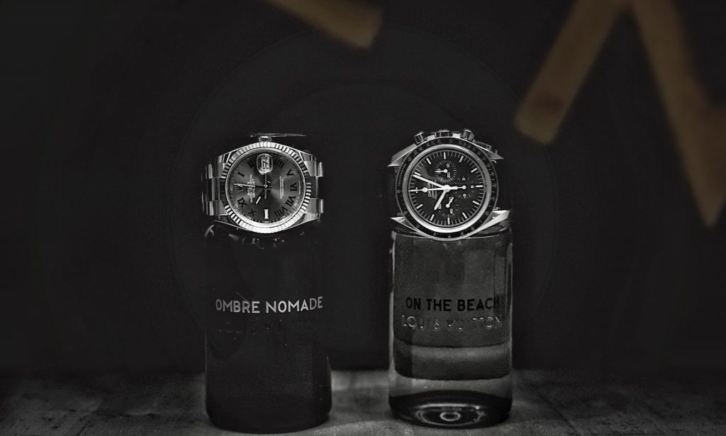 a couple of watches sitting on top of each other